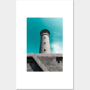 The lighthouse against blue sky Posters and Art